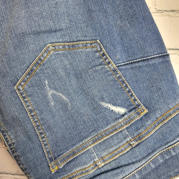 Torrid Distressed Bomshell Skinny Jeans - Picture 4 of 10